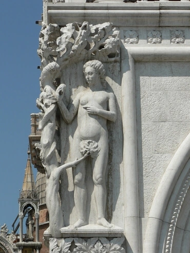 This relief, showing Eve taking fruit from the serpent, is on the  Palazzo Ducale in Venice, dating from the 14th century