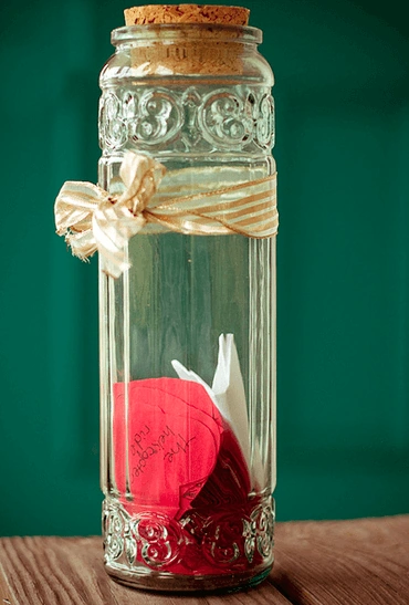 Photo of notes in a jar, by Jenny Stein
