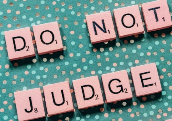 Do not judge, written with Scrabble letters.